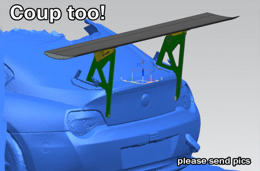 A 3D-rendered image of a BMW Z4 with a large wing spoiler mounted on the trunk using green brackets. Text on the image reads, "Coup too!" at the top and "please send pics" at the bottom. Featuring the BMW Z4 Big Wang Kit by 9livesracing for a sleek, aerodynamic look.