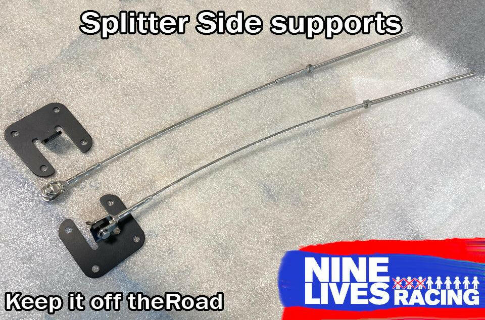 Image displaying two S2000 Sturdy Boii Splitter Mounts along with mounting hardware against a plain background. The text "Splitter Side Supports" is at the top, "Keep it off the Road" at the bottom left, and "9livesracing" with a racing flag logo at the bottom right. Honda S2000 Sturdy Boii Splitter Mounts designed for optimal downforce included.