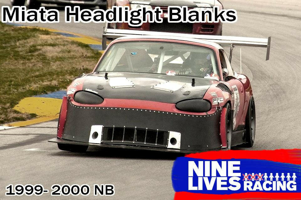 A red race car with a heavily modified front bumper and headlight blanks races on a track. Crafted from robust plastic, the text reads "Miata Headlight Blanks NB1-Only," "1999-2000 NB," and "Nine Lives Racing.