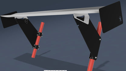 The Exocet v2 Big Wang Kit by 9livesracing features a sleek, modern design showcased at an angle. It sports a minimalistic aesthetic with a flat white surface supported by black angular brackets connected to bold red cylindrical legs, embodying its contemporary, Exocet-inspired look.