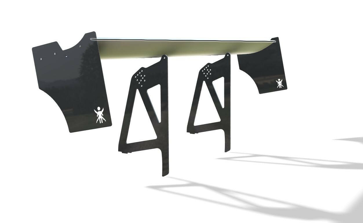 Two 3-Series Big Wang kits (’14-18 F80 / F82 / F83) by 9livesracing, complete with triangular stands and silhouette figures, are set up in an outdoor shooting range. The stands, reminiscent of extruded aluminum wings, feature both triangular and circular cutouts near the top. They are designed for target practice and cast shadows on the white background.