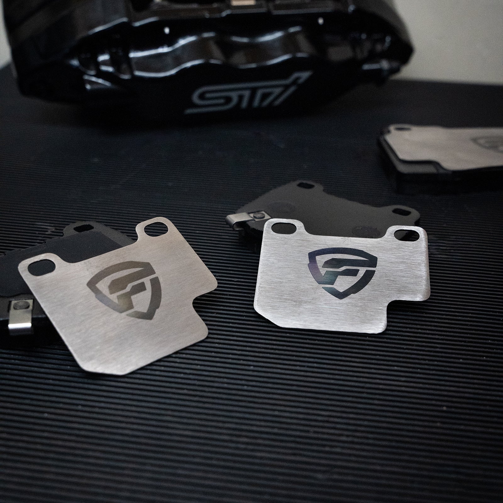 FactionFab Titanium Rear Brake Shim Set 2 Piston Brembo / 2004-2017 STI - Graveyard Performance