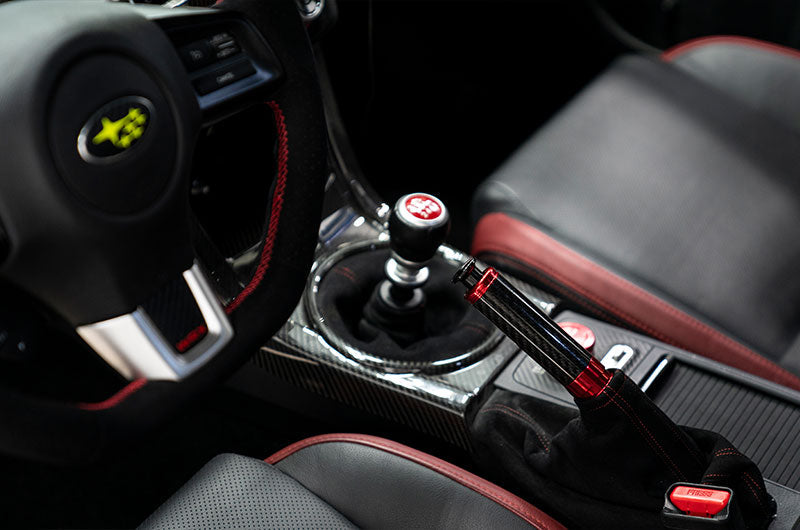 OLM Signature Series Ebrake Handle (Black Carbon w/Red) - 2015-2021 WRX & STI / 2013-2022 FR-S / BRZ / 86 / 2014-2018 Forester / 2013+ *Crosstrek - Graveyard Performance