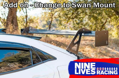 A white car sporting the Civic Type-R Wang kit 2017+ FK8 features a prominently mounted Big Wang GT3 swan mount spoiler on the rear. Supported by two black brackets for enhanced down-force, the text at the top reads "Add on - Change to Swan Mount." The bottom right corner proudly displays the 9livesracing logo.