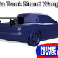 A blue sports car featuring a large rear wing is displayed, showcasing the "Miata Big Wang Kit '90-05 NA/NB" for increased down-force. Text reads "Miata Trunk Mount Wang Kit." The image includes the "9livesracing" logo in the bottom right corner, proudly highlighting its American-made quality.