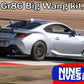 A silver sports car on a racetrack, equipped with a large rear wing made from extruded aluminum wings, is captured in motion. "GR86 / BRZ Wang Kit '22+" is text at the top. The bottom right corner features a "9livesracing" logo with a red and blue design.