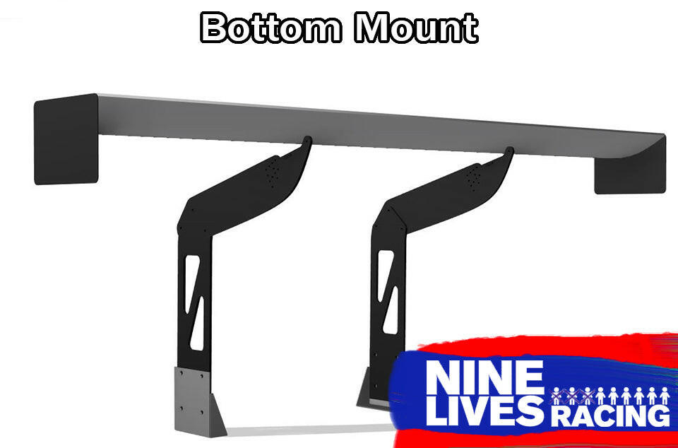 The 9livesracing Camaro Wang 2016+ 6th Gen Chassis Mount features two black, adjustable supports with a grey "Bottom Mount" wing. The Nine Lives Racing logo, displaying white text and a line of nine stick figures, is situated in the bottom right corner against a red and blue background. This design optimizes downforce for GT3 performance.