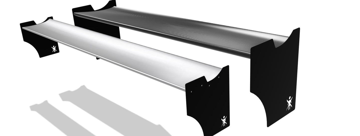 A digital rendering features two sleek, modern, rectangular benches with black side supports and metallic seats. Each bench, characterized by its minimalist, angular design elements crafted from light aluminum, proudly displays a small logo of a stylized figure on the side supports. The benches cast shadows from a light source. The design is evocative of the 9livesracing Audi TT 2nd gen. 06-2014 aesthetic.