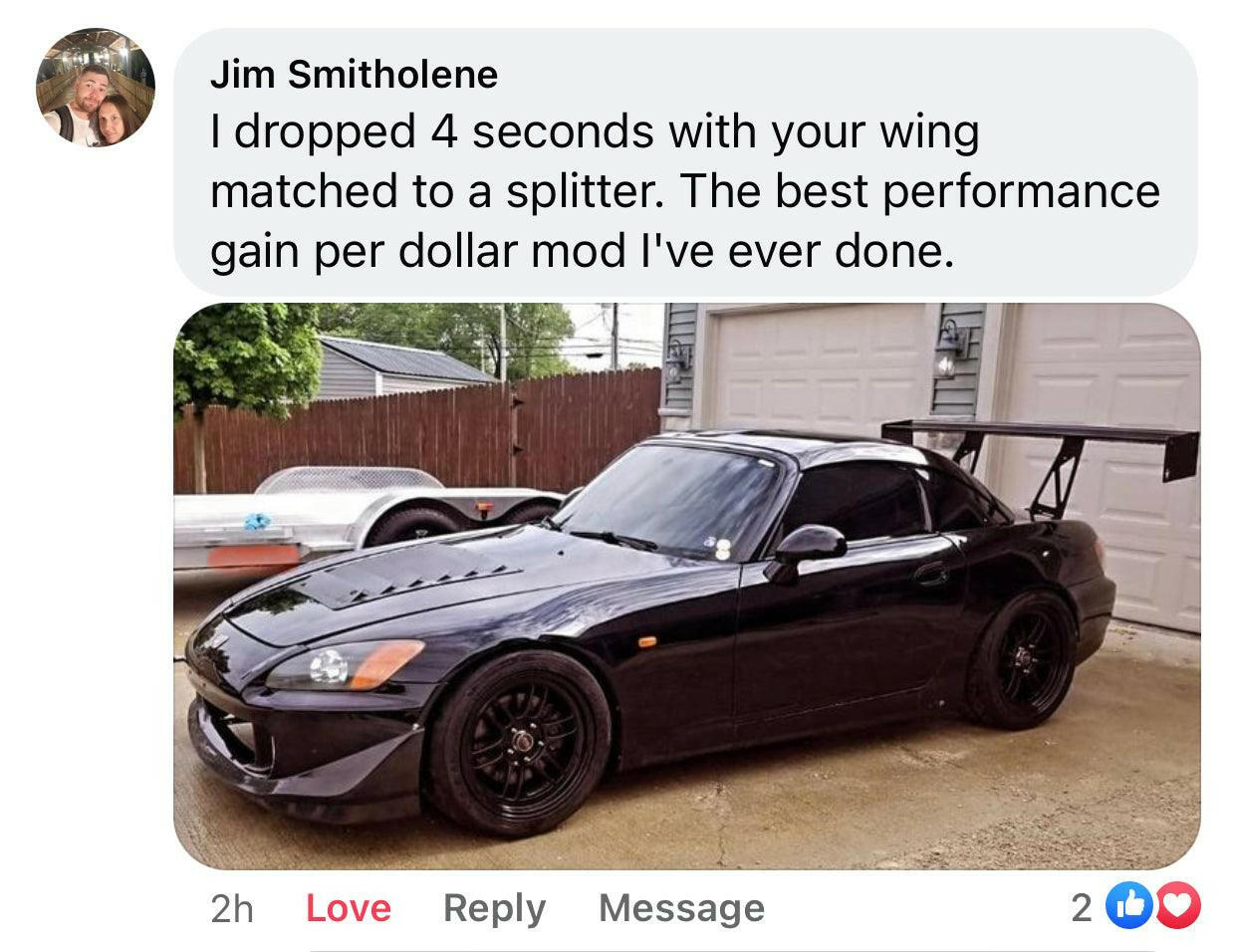 A Facebook post by Jim Smitholene showcases a sleek black Honda S2000 equipped with the S2000 Big Wang Chassis Mount Kit '99-09 AP1/AP2 from 9livesracing and a black front splitter. The text above reads: "I dropped 4 seconds with your wing matched to a splitter. The best performance gain per dollar mod I've ever done." Reactions include Love and Like.