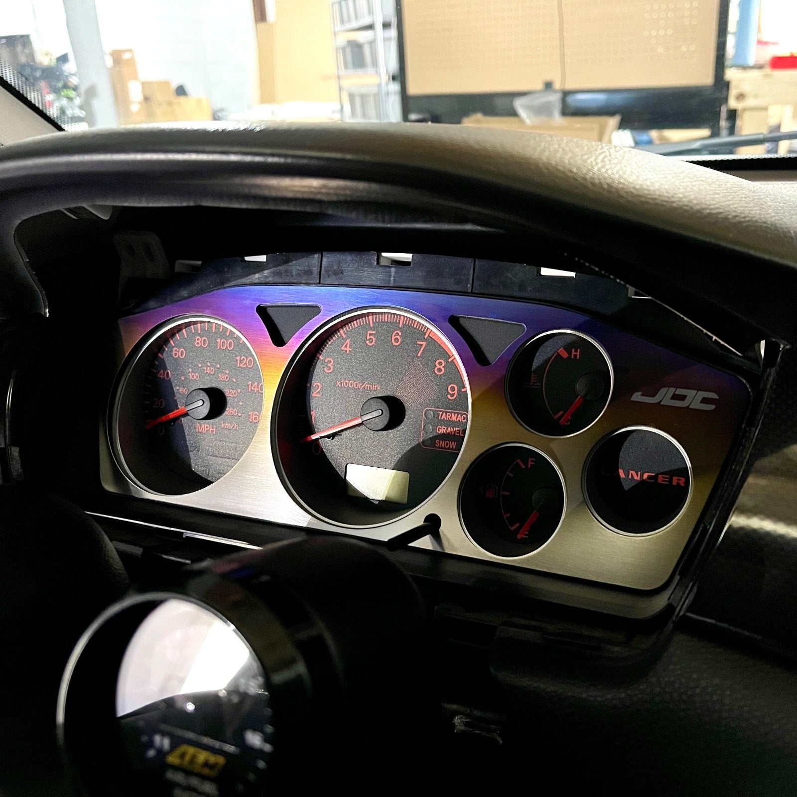 JDC Titanium Gauge Cluster Overlay (Evo 7/8/9) - Graveyard Performance
