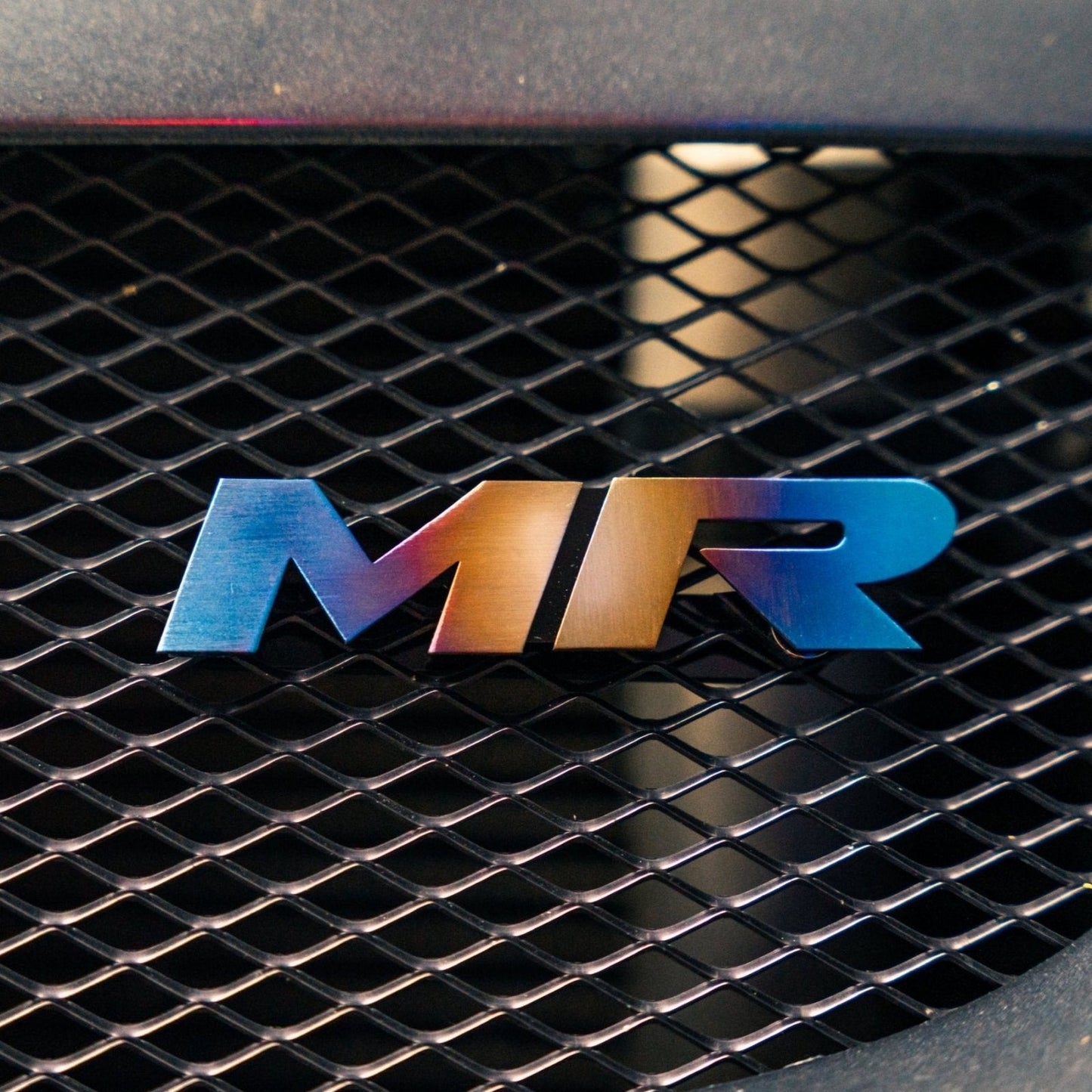 JDC Titanium "MR" Front Grill Badge (Evo 8/9) - Graveyard Performance
