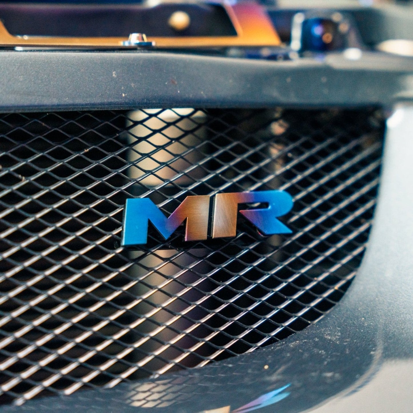 JDC Titanium "MR" Front Grill Badge (Evo 8/9) - Graveyard Performance