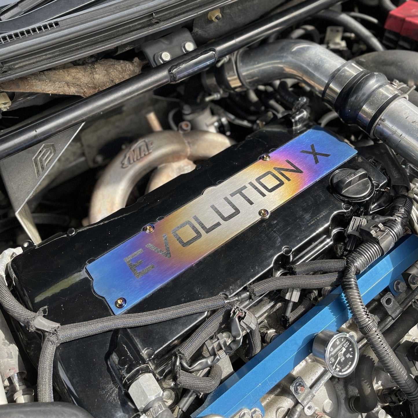 JDC Titanium Spark Plug Cover (Evo X) - Graveyard Performance