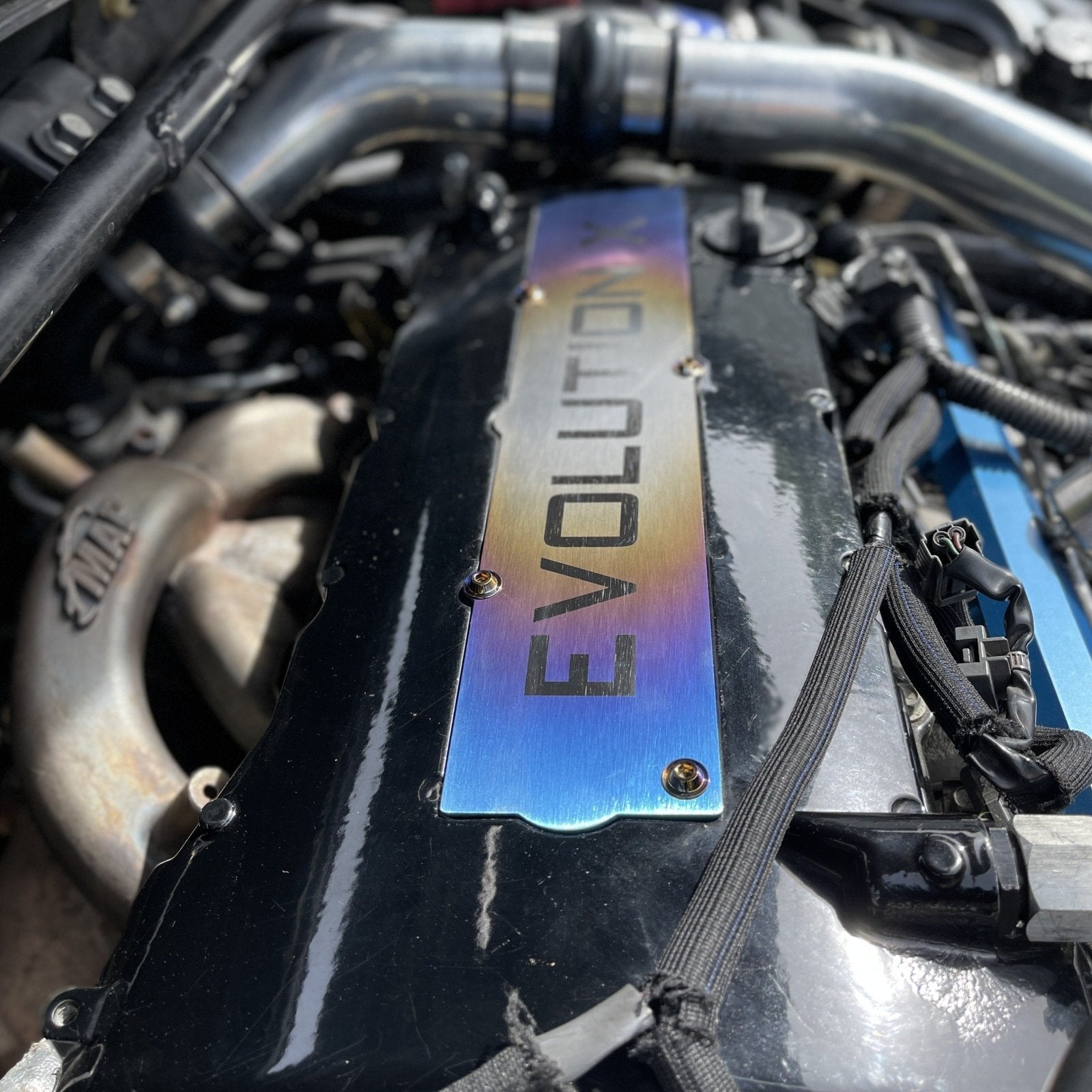 JDC Titanium Spark Plug Cover (Evo X) - Graveyard Performance