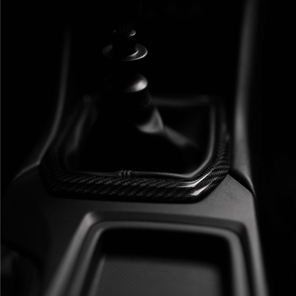 JDMuscle [22-26 WRX] MT Tanso Pre-preg Carbon Fiber Shifter Trim Cover w/ Gloss Finish - Graveyard Performance
