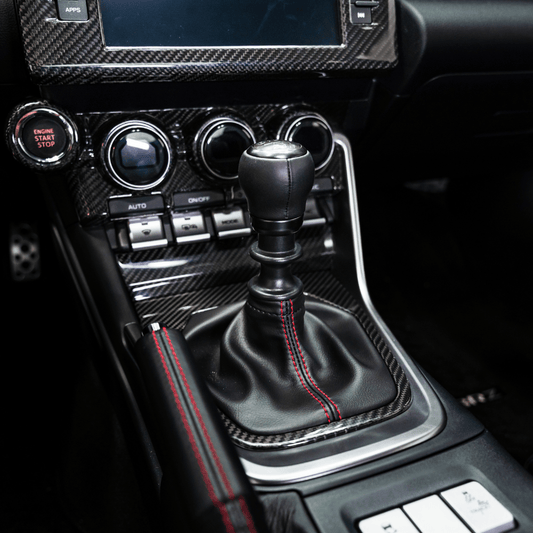 JDMuscle 22+ BRZ/GR86 MT Pre-preg Carbon Fiber Shifter Trim Cover w/ Gloss Finish - Graveyard Performance