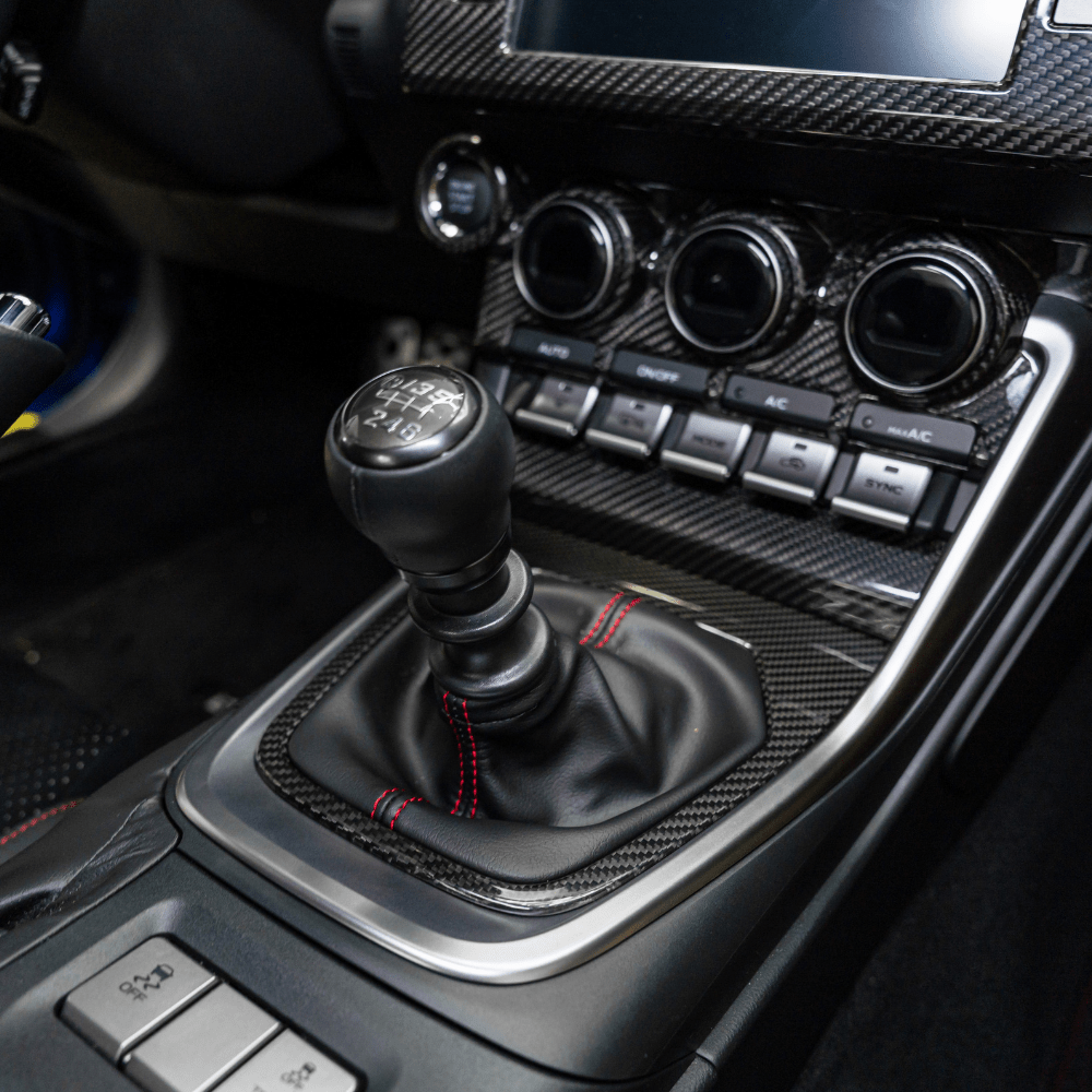 JDMuscle 22+ BRZ/GR86 MT Pre-preg Carbon Fiber Shifter Trim Cover w/ Gloss Finish - Graveyard Performance