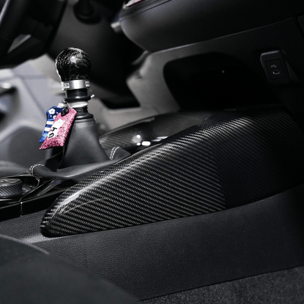 JDMuscle [23-25 GR Corolla, 19+ Hatch] Carbon Fiber Center Console Cover - Graveyard Performance