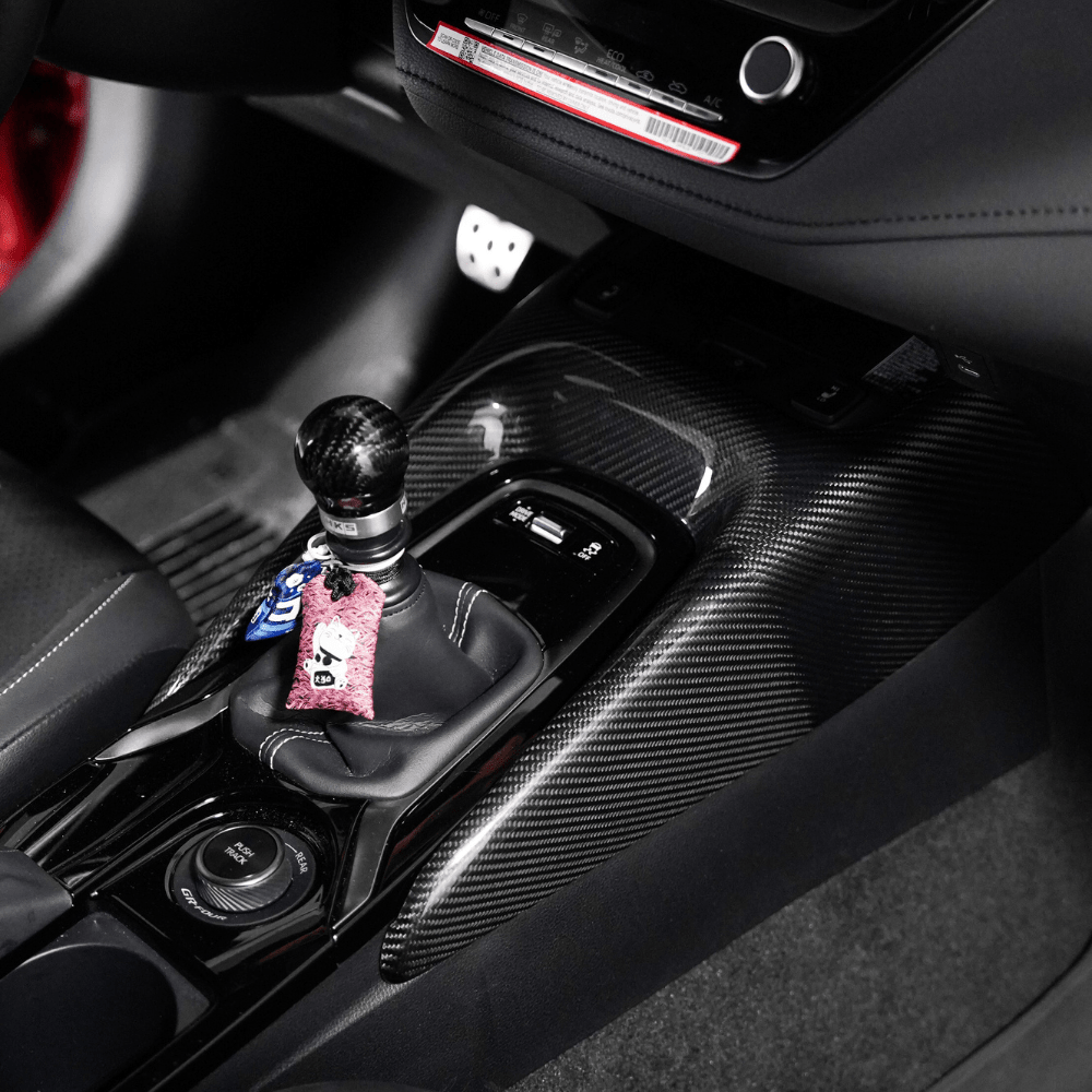 JDMuscle [23-25 GR Corolla, 19+ Hatch] Carbon Fiber Center Console Cover - Graveyard Performance
