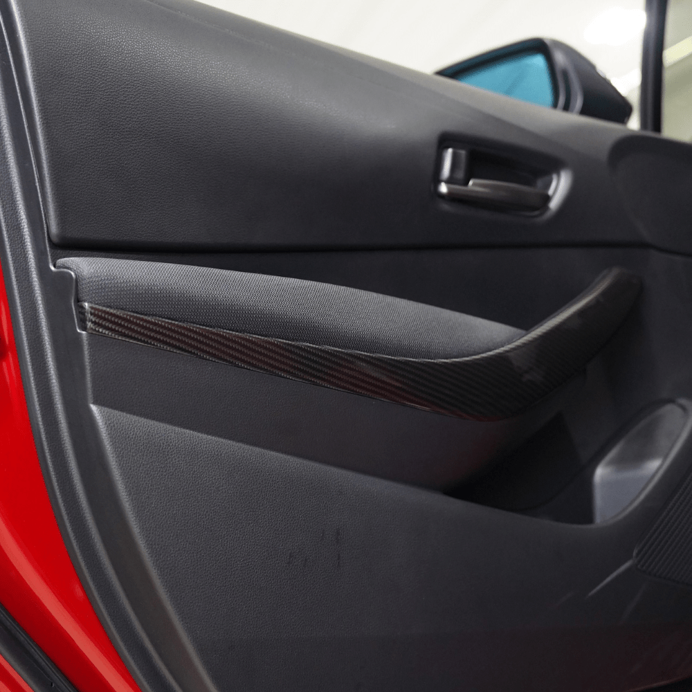 JDMuscle [23-26 GR Corolla] Carbon Fiber Interior Door Handles Covers (Front 2 PCS) - Graveyard Performance