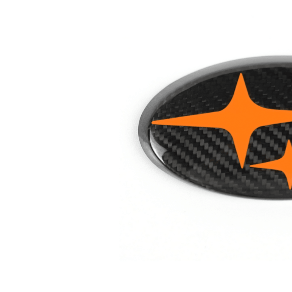 JDMuscle Tanso Carbon Fiber Subaru Emblem Covers Front & Back, Red/White/Blue [22-25 WRX, 15-21 WRX/STI, 18-23 Crosstrek, 17-23 Impreza] - Graveyard Performance