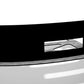A minimalistic architectural design featuring the Nine Lives Racing Mazda Miata CarNards for 90-05 air dams, exhibiting a sleek black curved structure with side extensions and a central rectangular opening, reminiscent of the streamlined aerodynamics of a Mazda Miata. Set against a gradient white to grey background, the structure casts shadows on the grey floor beneath it.