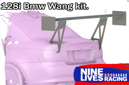 A digital rendering of a purple BMW 128i car with a Big Wang GT3 spoiler installed on the trunk. The text "128i Big Wang Kit '07-13 E82" is displayed at the top, and a "9livesracing" logo is at the bottom right corner, showcasing its sleek design and enhanced down-force adjustments.