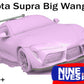 A digital rendering of a modified Toyota Supra with a large rear wing. The text "Supra Big Wang Kit '20+ A90" is at the top, and "9livesracing" along with a logo is at the bottom right. The light purple rendering showcases extruded aluminum wings labeled "2020+" in the bottom left.