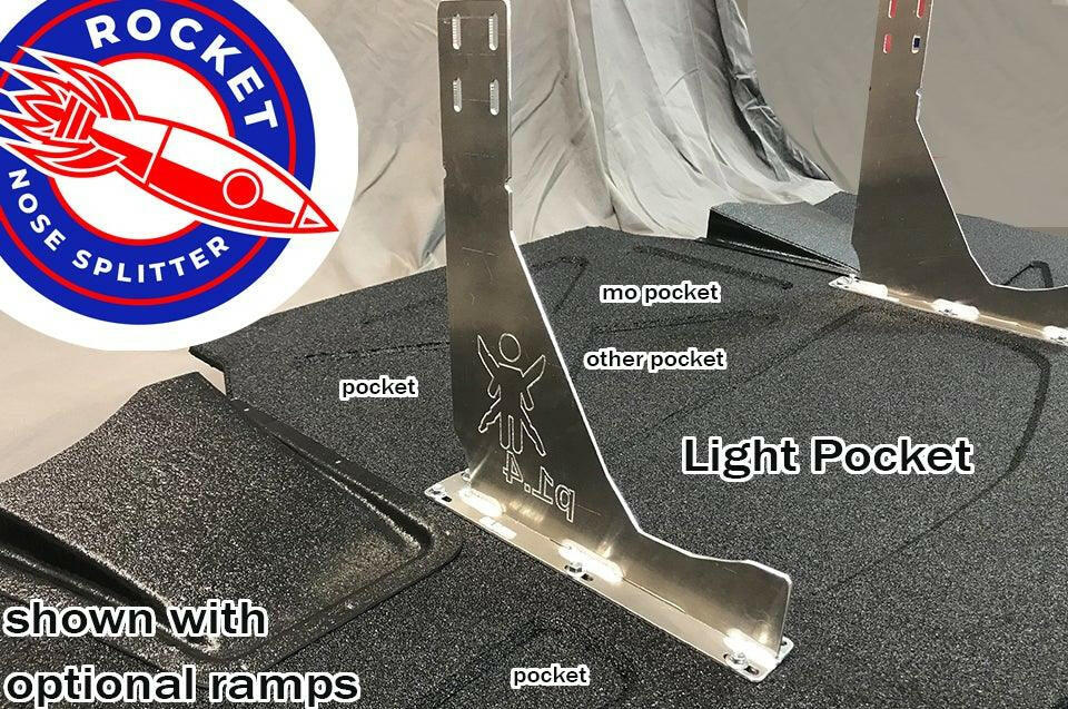 Image of a Corvette Rocket Nose Splitter ’97-04 C5 from 9livesracing with various labeled parts. The metallic Light Pocket piece in the center is surrounded by "pocket", "mo pocket", "other pocket", and optional ramps on a black surface. A CNC cut Corvette Rocket Nose V2 logo is visible in the upper left corner, enhancing downforce and precision.