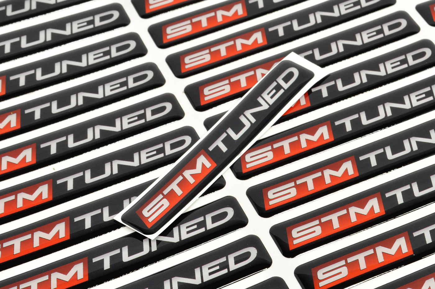 STM Tuned Badge