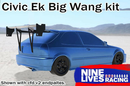 A blue Honda Civic Hatch Ek from the 96-2000 model range, outfitted with the "Civic Hatch Ek Wang kit 96-2000" and aluminum wings by 9livesracing, is showcased in a desert setting. The car features black wheels and displays CFD v2 endplates on the wing for enhanced down-force and improved performance.