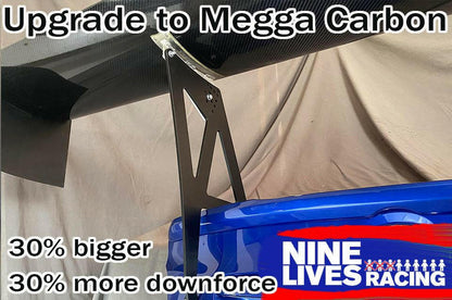 A promotional image showcasing a close-up of a car spoiler with the text "Upgrade to Subaru Impreza / WRX / STI Big Wang kit 14-21 VA" at the top. Installed on a blue Subaru Impreza, this 30% bigger spoiler offers 30% more downforce. The 9livesracing logo is at the bottom right.