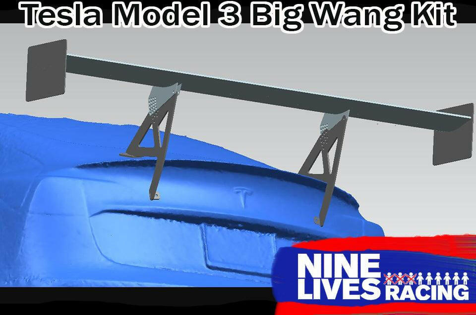 A blue Tesla Model 3 is depicted from the rear, featuring a substantial, extruded aluminum wing known as the "Tesla Model 3 Big Wang Kit," installed for optimal down-force. The text at the top reads "Tesla Model 3 Big Wang Kit," and the "9livesracing" logo is positioned in the bottom right corner.