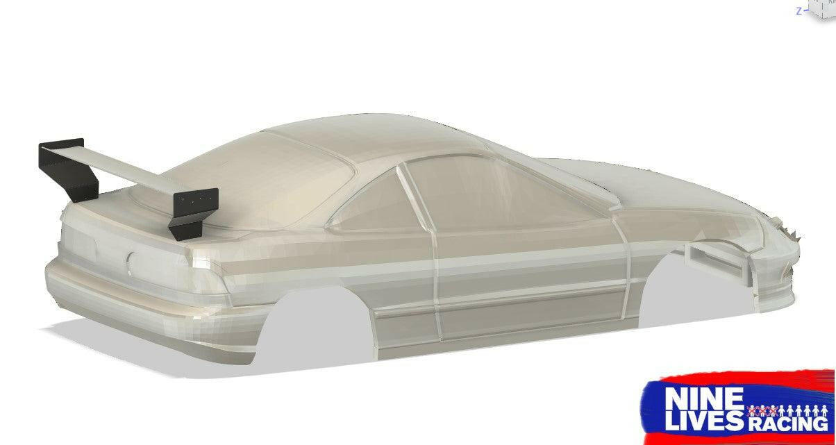 A transparent 3D model rendering of a car featuring the Integra V2 Big Wang Kit '94-01 DC2 with prominent endplate mounts is depicted. The model is primarily in a light gray color, and the logo of "9livesracing" is displayed in the bottom right corner with a blue and red background.