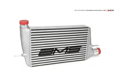 AMS Performance 08-15 Mitsubishi EVO X Front Mount Intercooler w/Modular Cast End Tanks & Logo - Graveyard Performance