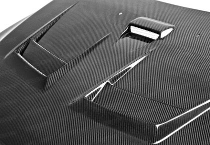 Seibon 08-15 Mitsubishi Lancer Evo X DV-Style Carbon Fiber Hood